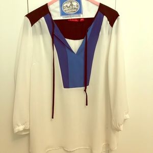 White blouse with blue and black design- size L